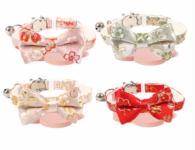 Gold-stamped bow cat collar with engraving