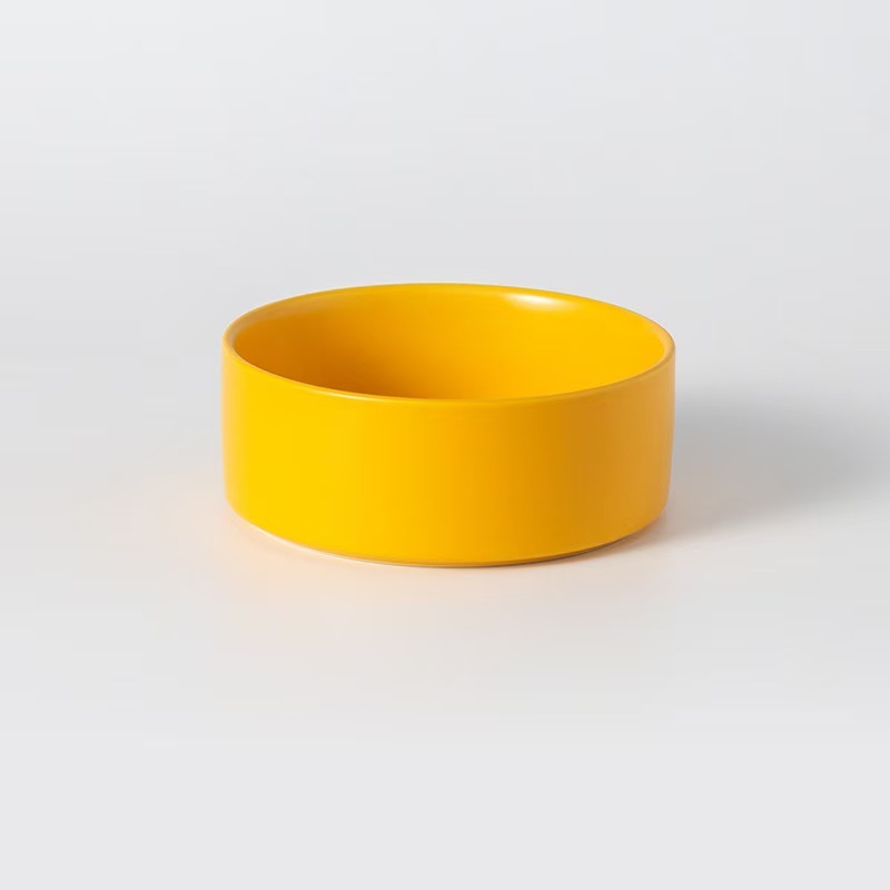 Assorted ceramic bowls for cats and dogs, with wooden stand