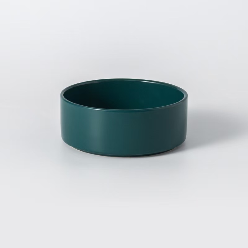 Assorted ceramic bowls for cats and dogs, with wooden stand