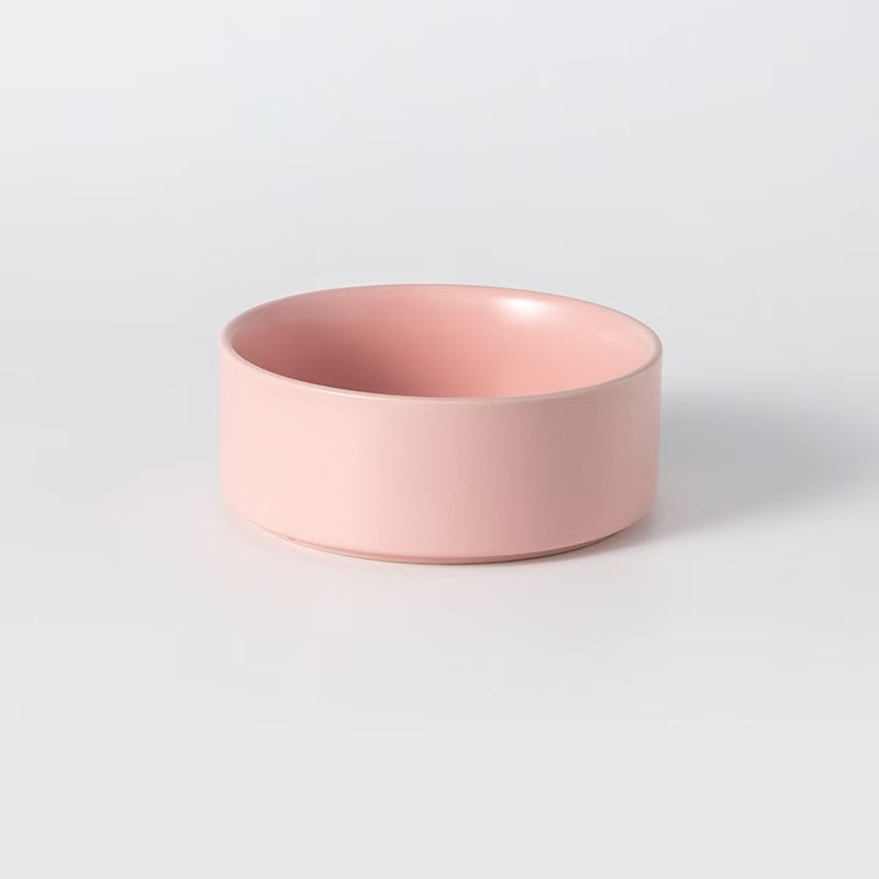Assorted ceramic bowls for cats and dogs, with wooden stand