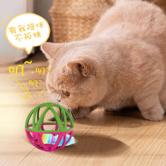 Rattling ball for mice inside a plastic cat cage