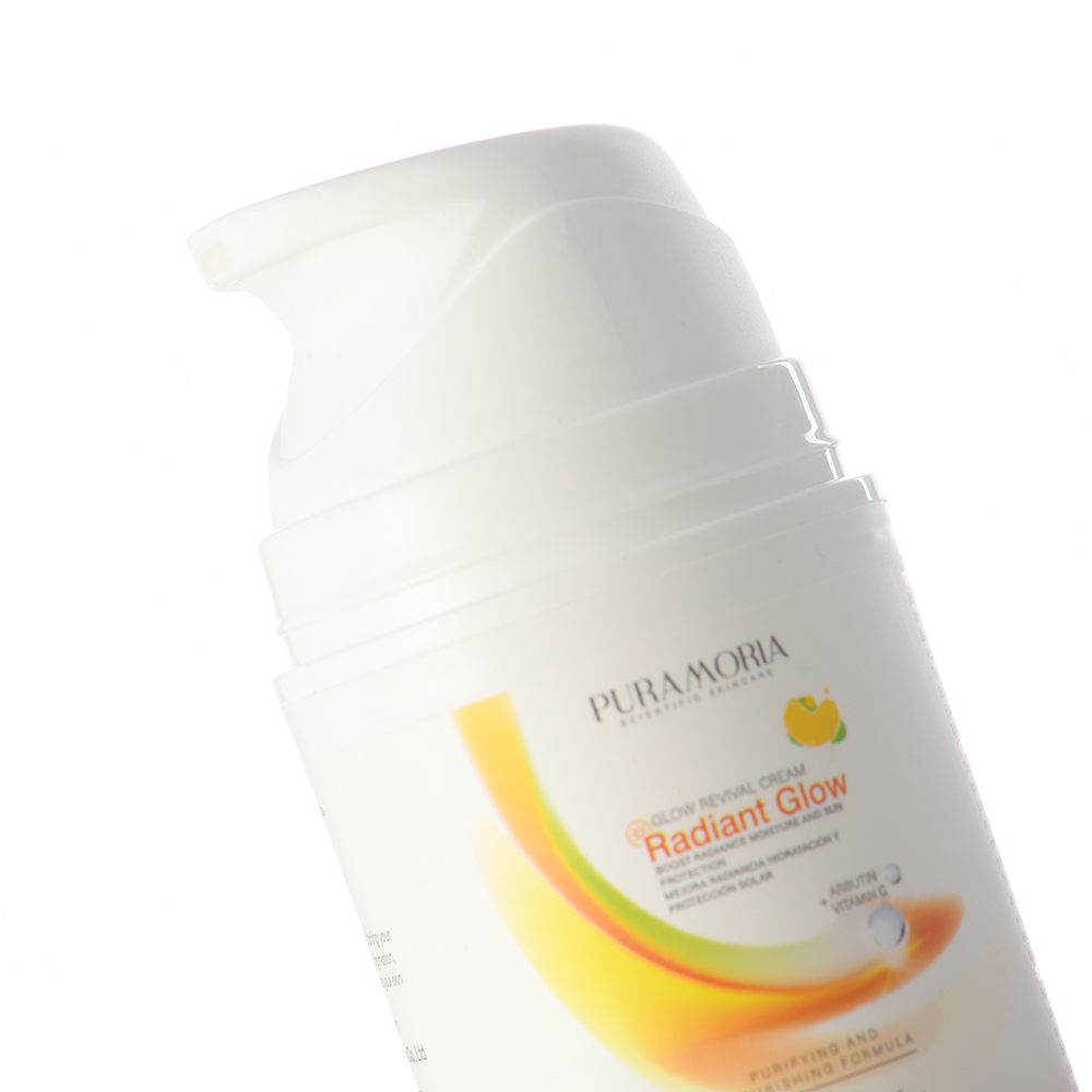 Applying PURAMORIA Radiant Glow Face Cream to the face for daily skin care.