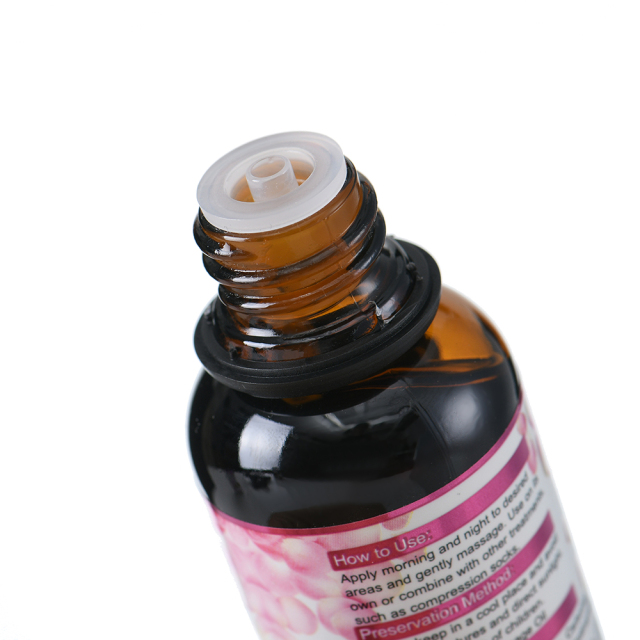 Close-up of Daqan Soothing Rose Massage Oil texture for smooth application