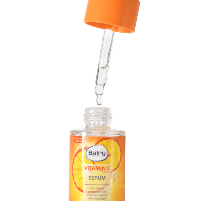 A close-up of a drop from our private label Vitamin C serum, showing its lightweight, non-sticky texture ideal for mass-market skincare formulations.