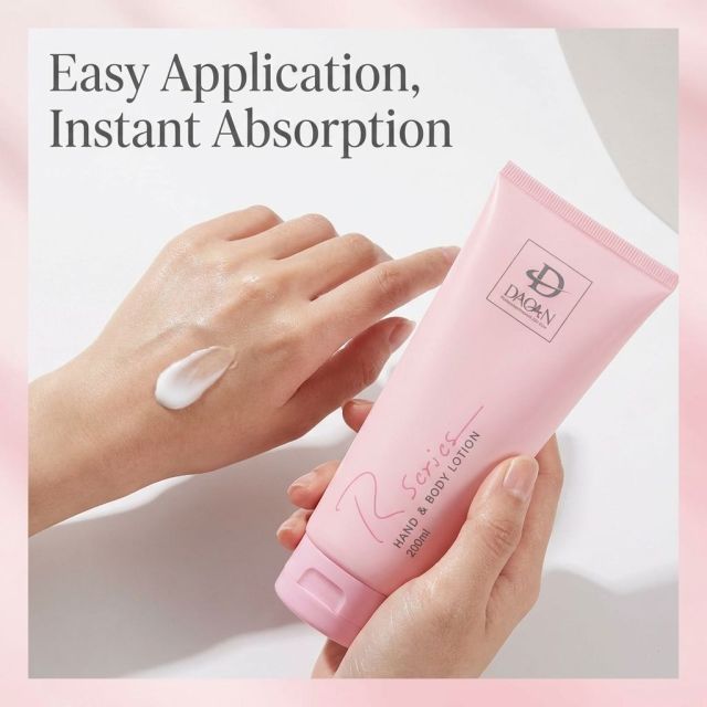 Professional model applying DAQAN hand and body lotion for instant skin absorption and moisturizing.