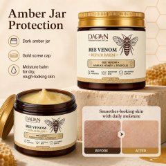 Two DAQAN Bee Venom Repair Balm jars in dark amber packaging with a creamy balm texture and a before-and-after dry-skin comparison graphic.