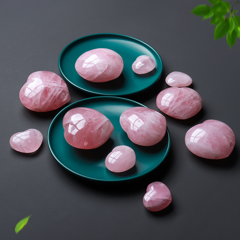 Natural rose quartz love crystal semi-precious stone, polished raw stone