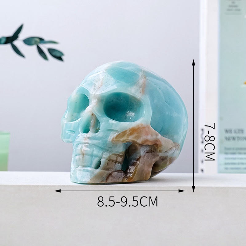Natural crystal sky blue sky river stone skull carving piece original stone polished