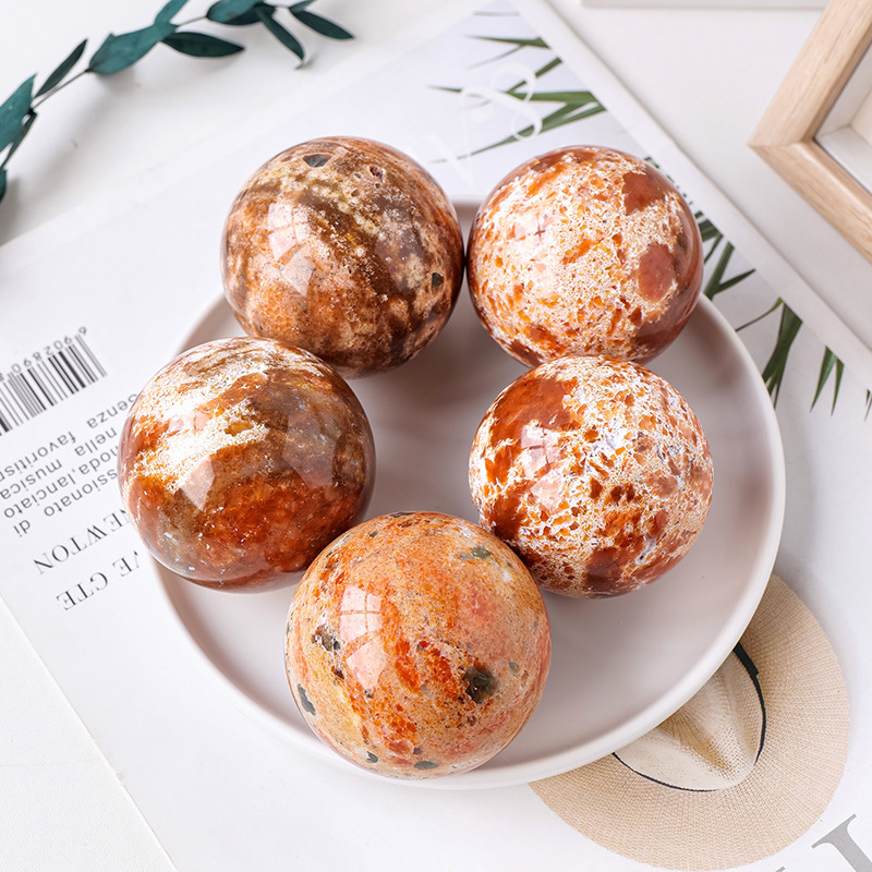 Natural crystal sunstone red jasper symbiotic ball ornaments original stone polishing