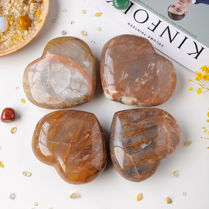 Natural crystal orange moonstone love ornaments, polished raw stone