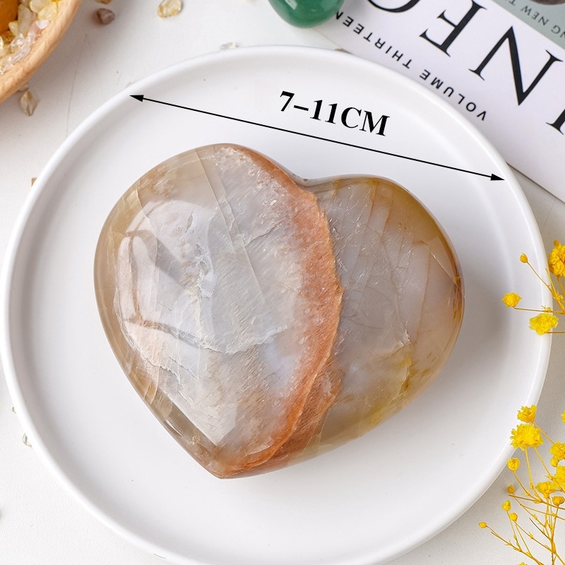 Natural crystal orange moonstone love ornaments, polished raw stone