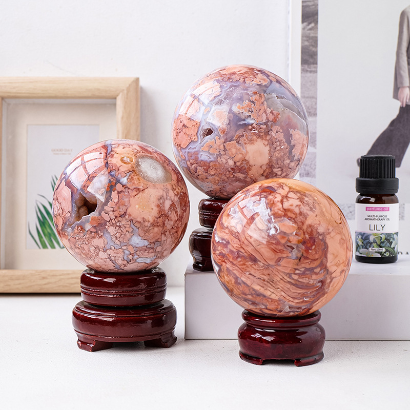 Natural pink agate crystal ball, raw stone polished energy stone