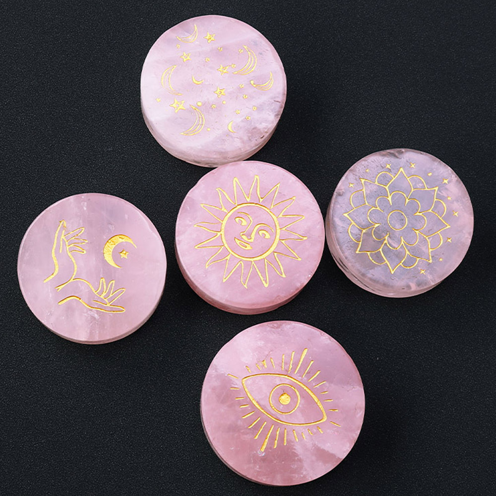 Natural rose quartz disc with laser engraved logo and gold pattern