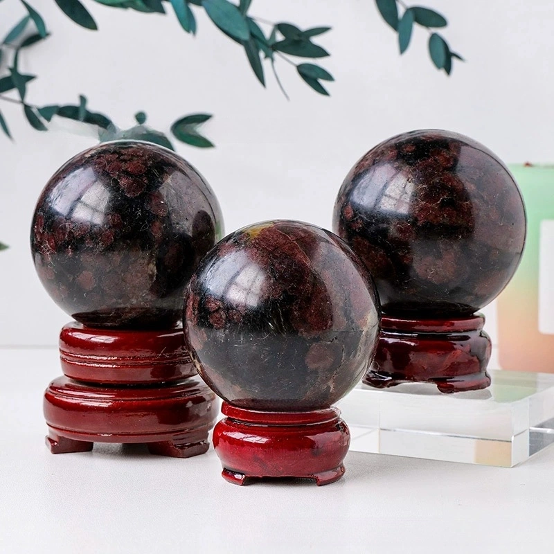 Natural garnet crystal ball ornaments crystal raw stone polished