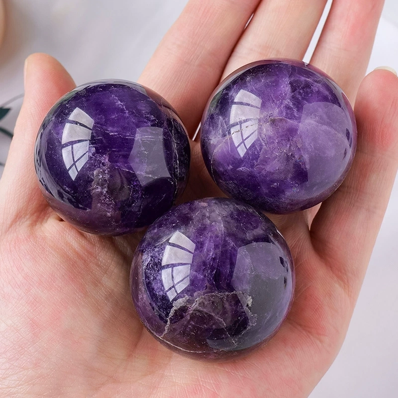 Natural Uruguayan amethyst ball, polished crystal raw stone