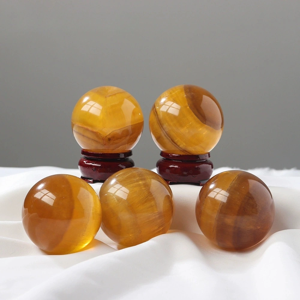 Natural crystal yellow fluorite ball raw stone hand-polished fluorite decoration