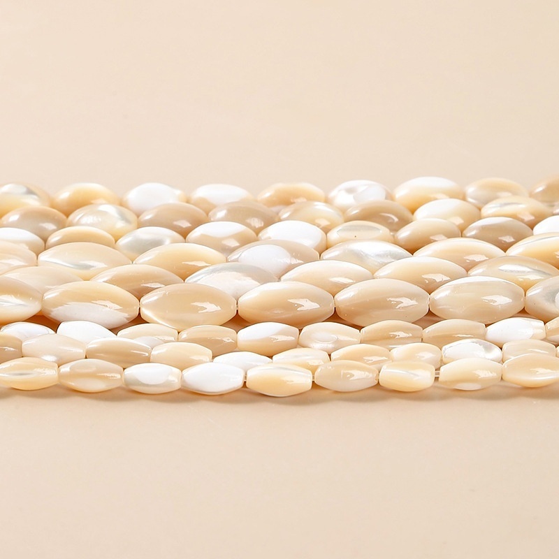 Natural coffee-colored horseshoe snail rice-shaped beads