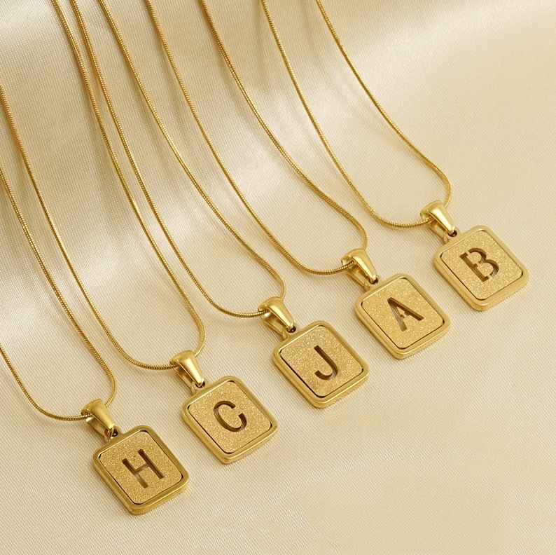 Fashion snake bone chain 18K letter necklace pressed sand letter pendant