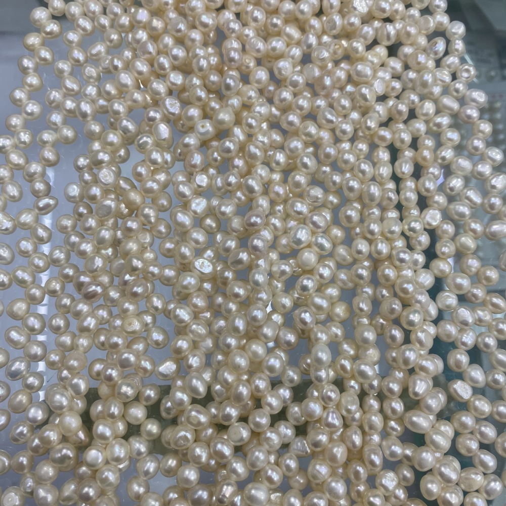 5-5.5mm 3/7 hole high-luster natural freshwater pearl DIY accessories