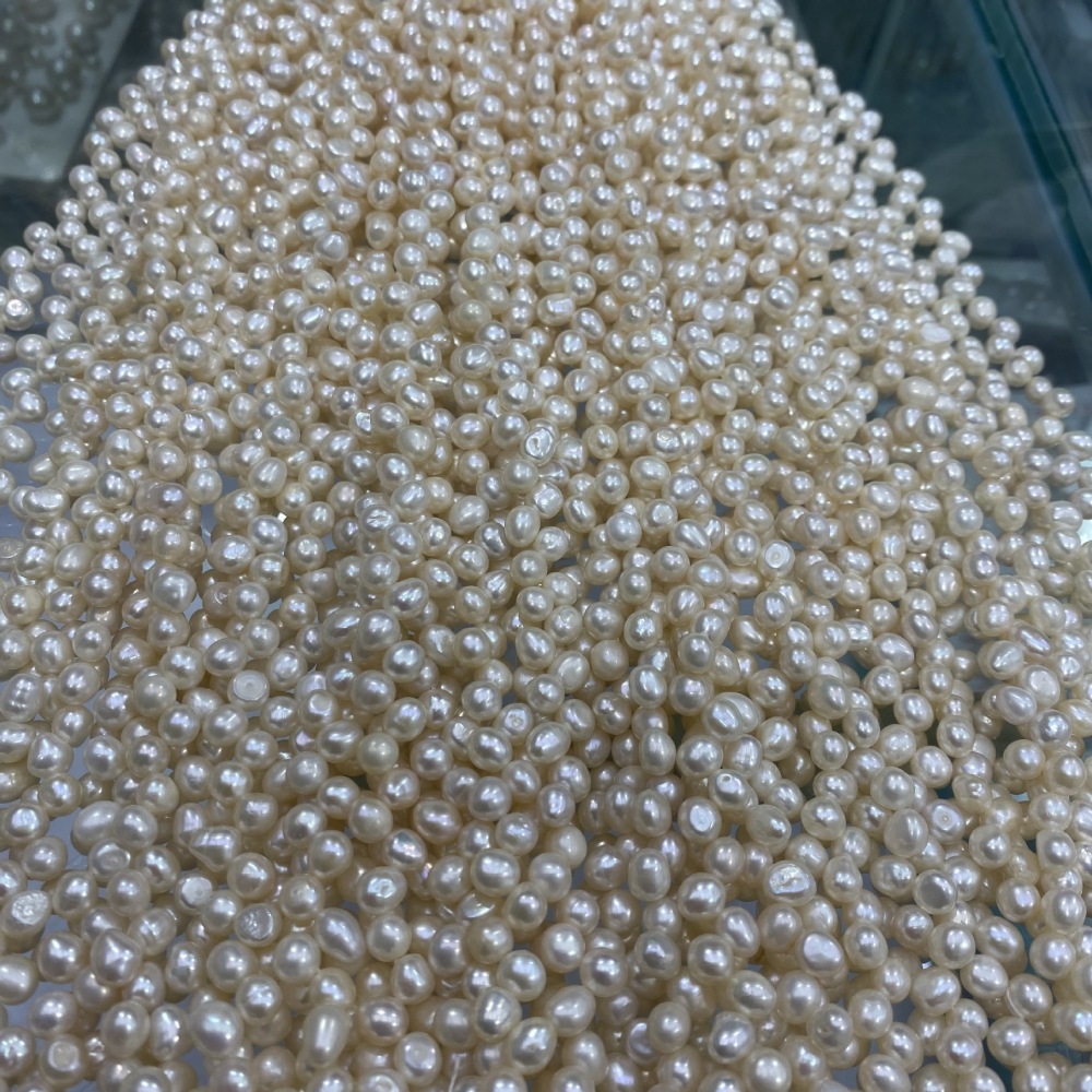 5-5.5mm 3/7 hole high-luster natural freshwater pearl DIY accessories