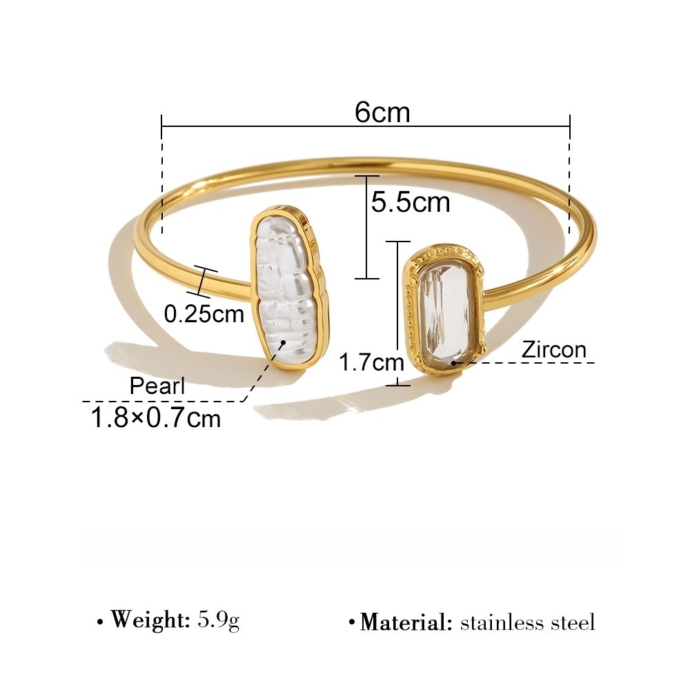 Stainless steel open bangle inlaid with irregularly shaped pearls