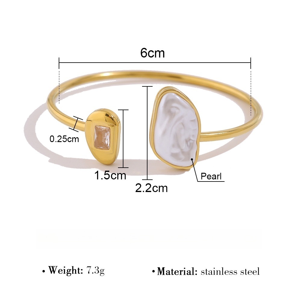 Stainless steel open bangle inlaid with irregularly shaped pearls