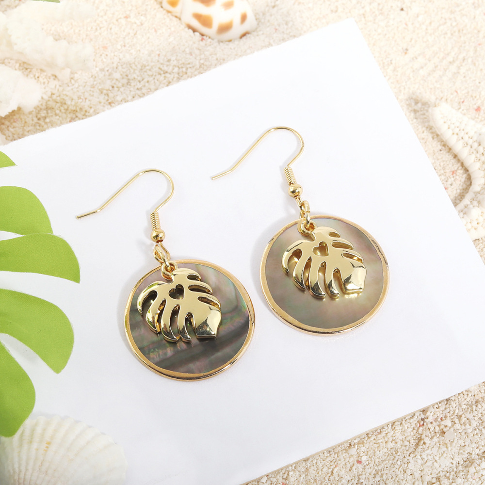 MYK1865-Tropical-style natural round black shell earrings with gold trim, island-themed earrings