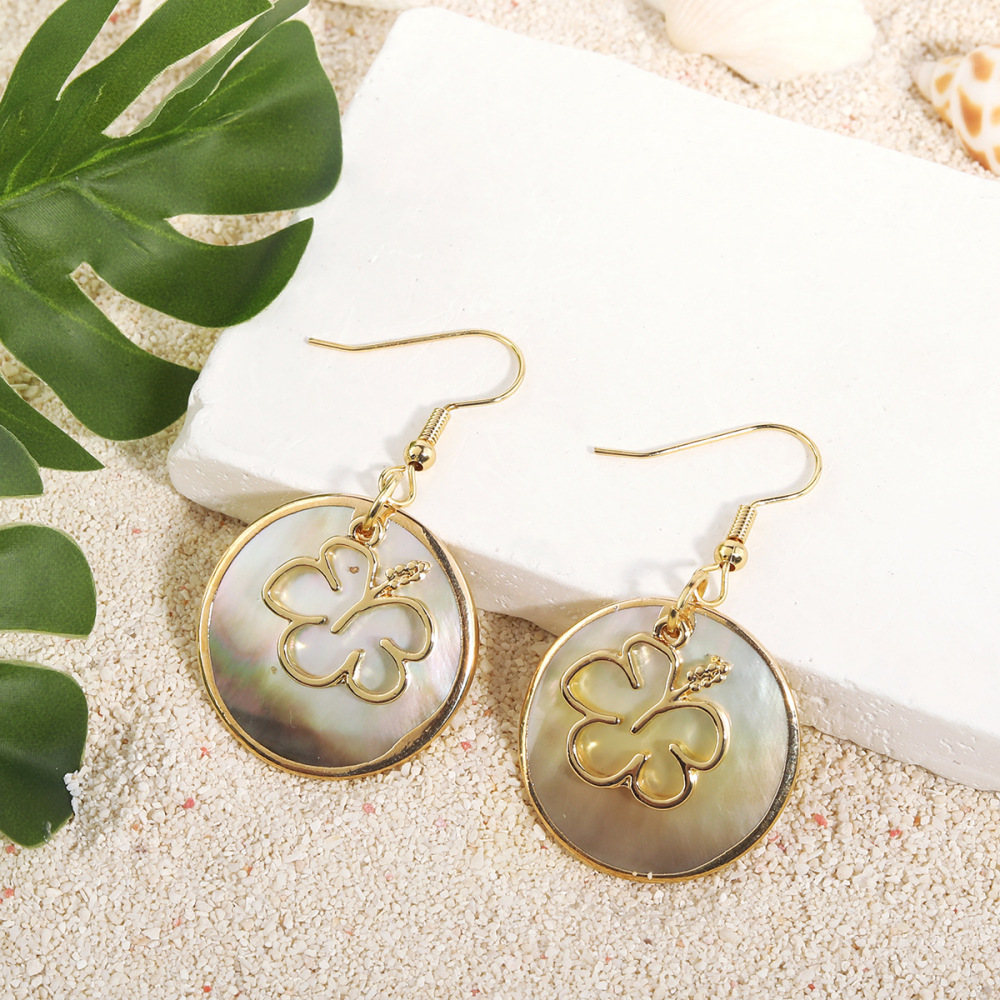 MYK1865-Tropical-style natural round black shell earrings with gold trim, island-themed earrings