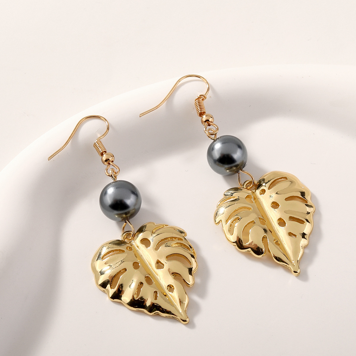 MYK1888-Palm leaf earrings with natural mother-of-pearl beads