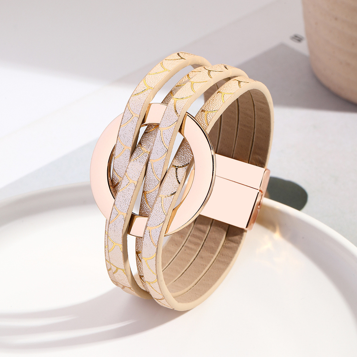 MYK1958-Cross-over leather women's bracelet with large metal ring cuff and magnetic clasp.