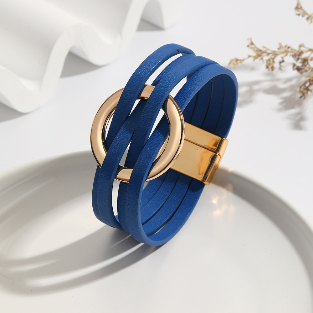 MYK1958-Cross-over leather women's bracelet with large metal ring cuff and magnetic clasp.