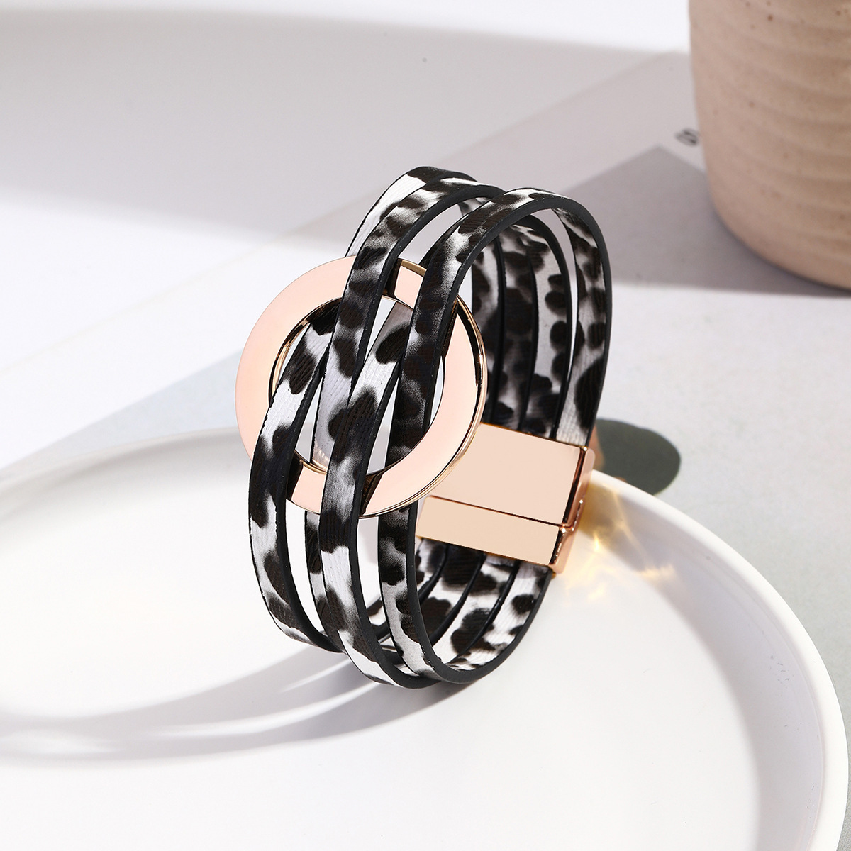 MYK1958-Cross-over leather women's bracelet with large metal ring cuff and magnetic clasp.