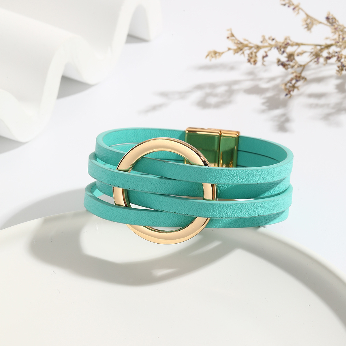 MYK1958-Cross-over leather women's bracelet with large metal ring cuff and magnetic clasp.