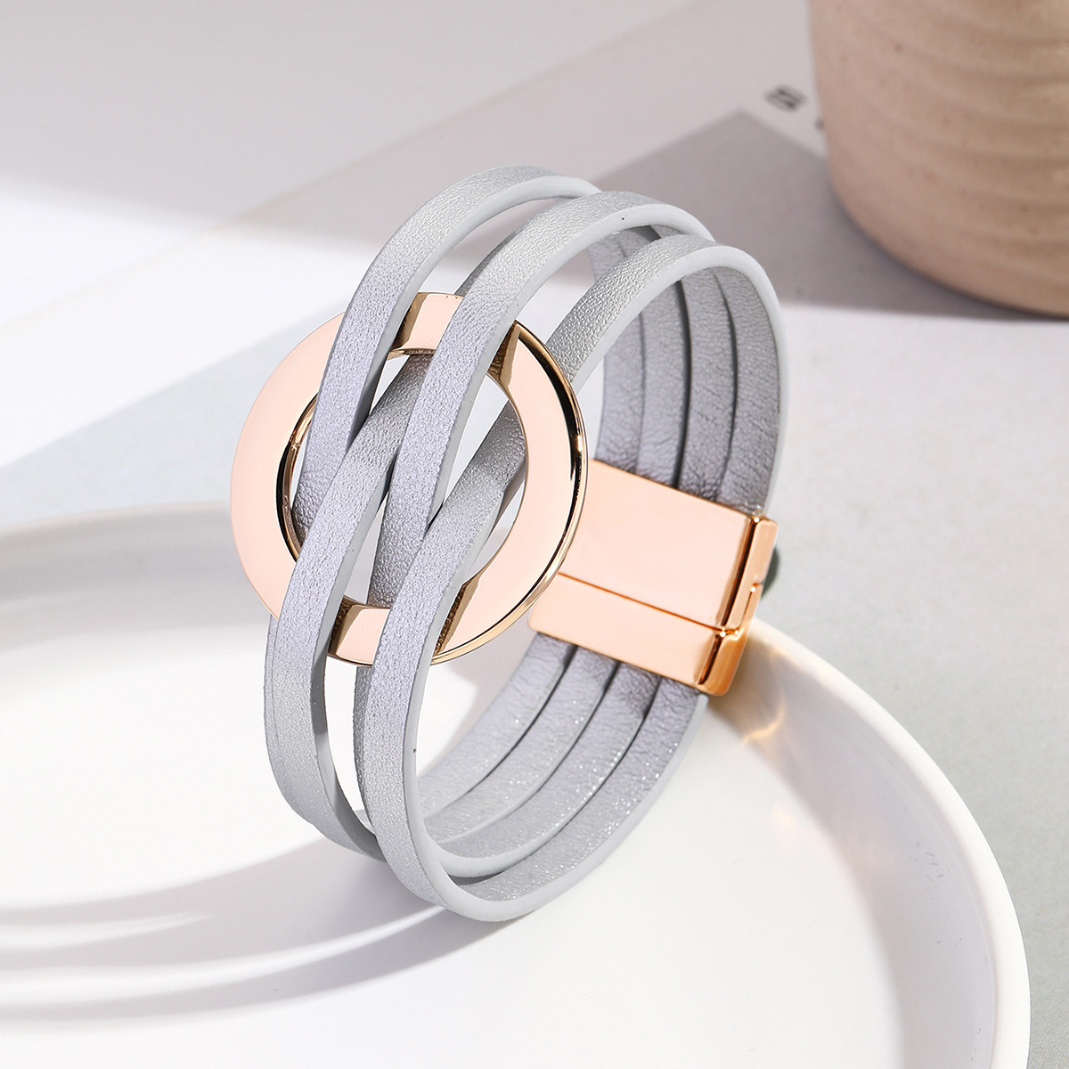 MYK1958-Cross-over leather women's bracelet with large metal ring cuff and magnetic clasp.