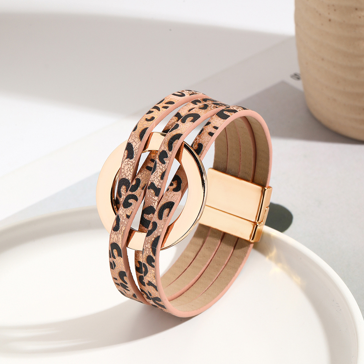 MYK1958-Cross-over leather women's bracelet with large metal ring cuff and magnetic clasp.