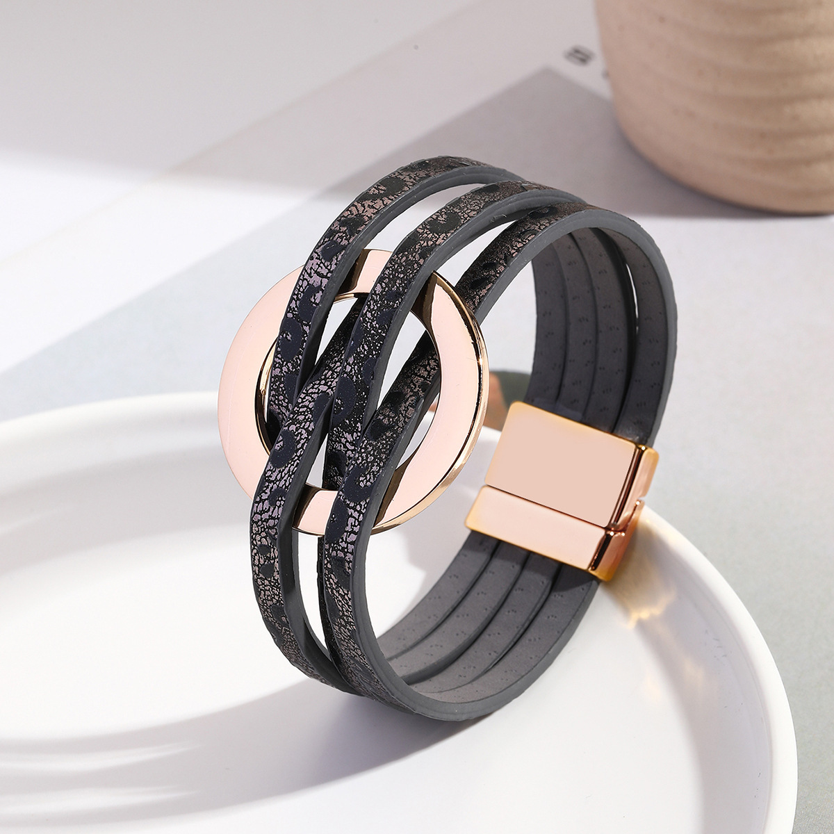 MYK1958-Cross-over leather women's bracelet with large metal ring cuff and magnetic clasp.