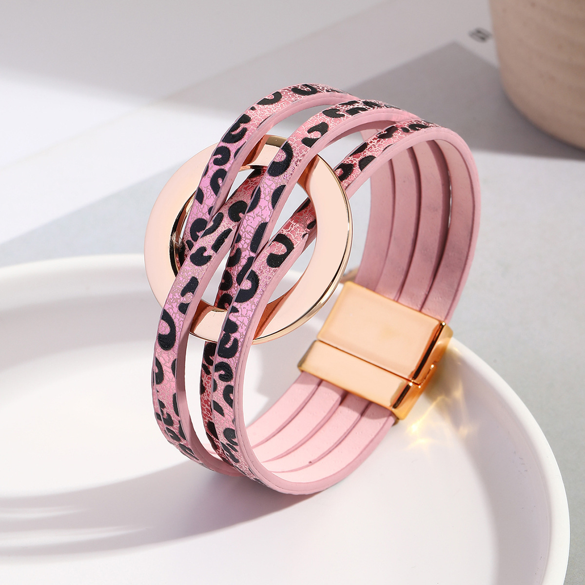 MYK1958-Cross-over leather women's bracelet with large metal ring cuff and magnetic clasp.