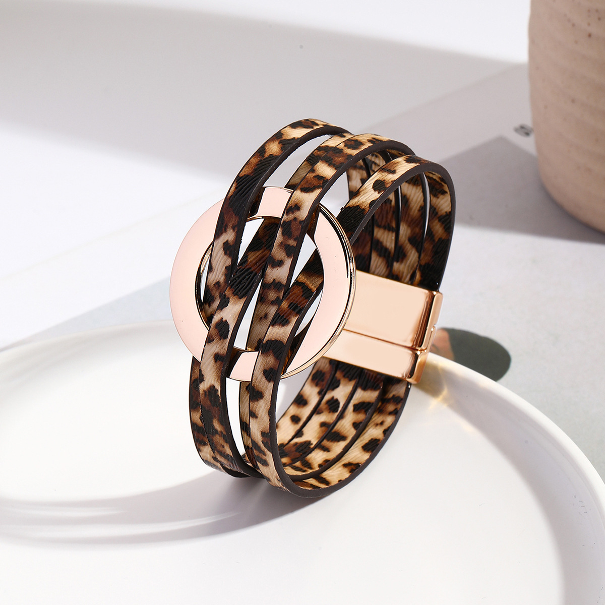 MYK1958-Cross-over leather women's bracelet with large metal ring cuff and magnetic clasp.