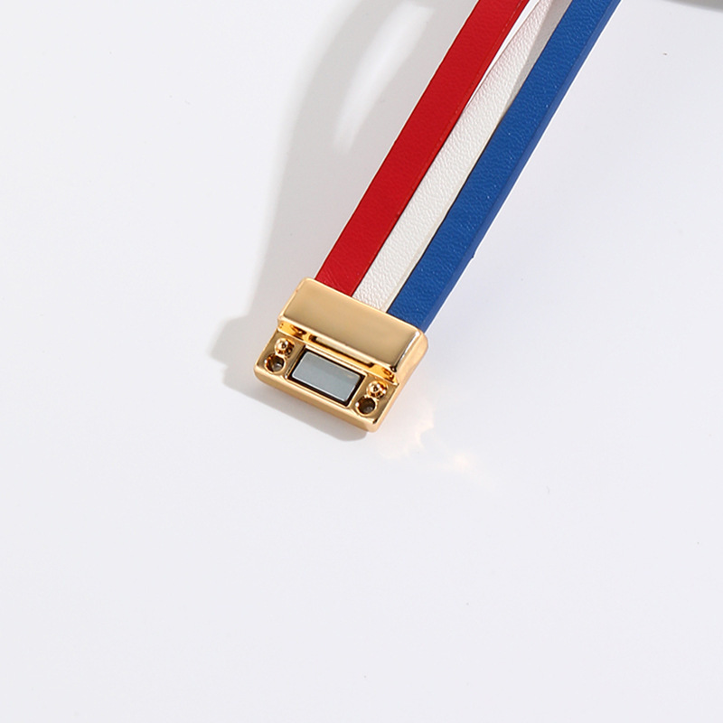 MYK2006-American flag-themed red, white, and blue heart-shaped leather bracelet with magnetic clasp.