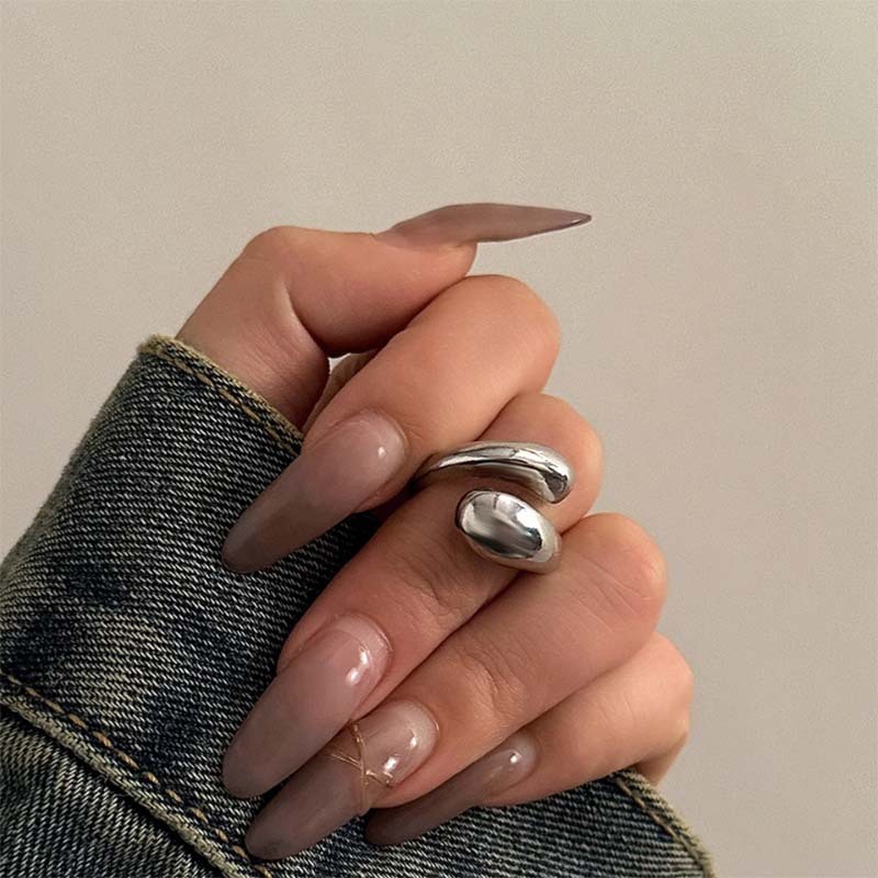 Stylish teardrop-shaped open cross ring