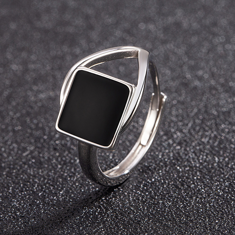 Square, unique black openwork ring