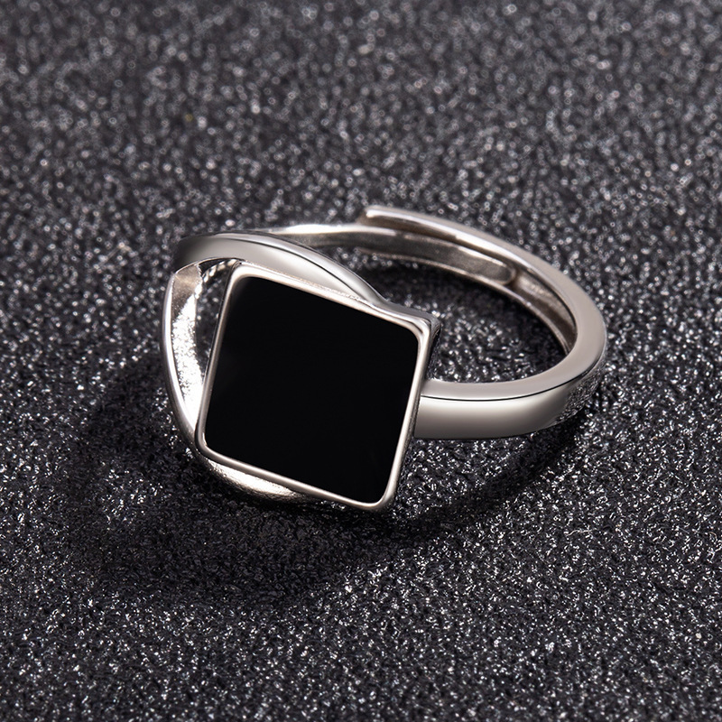 Square, unique black openwork ring