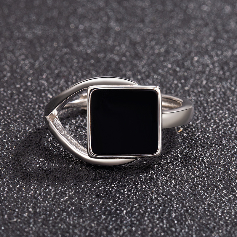 Square, unique black openwork ring