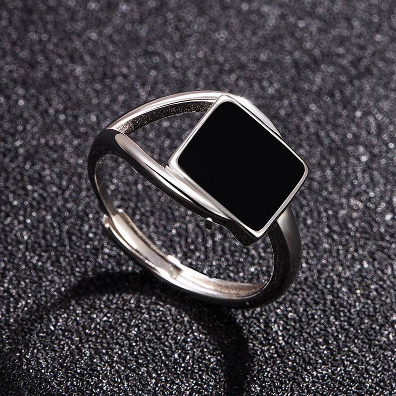 Square, unique black openwork ring