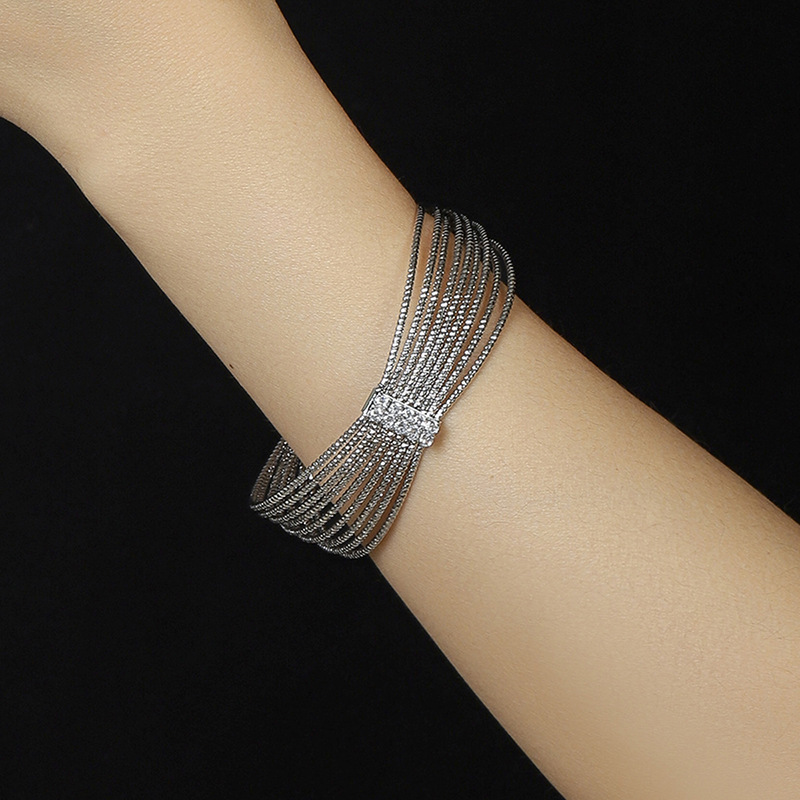 Simple Open-Tooth Zircon Copper Bangle