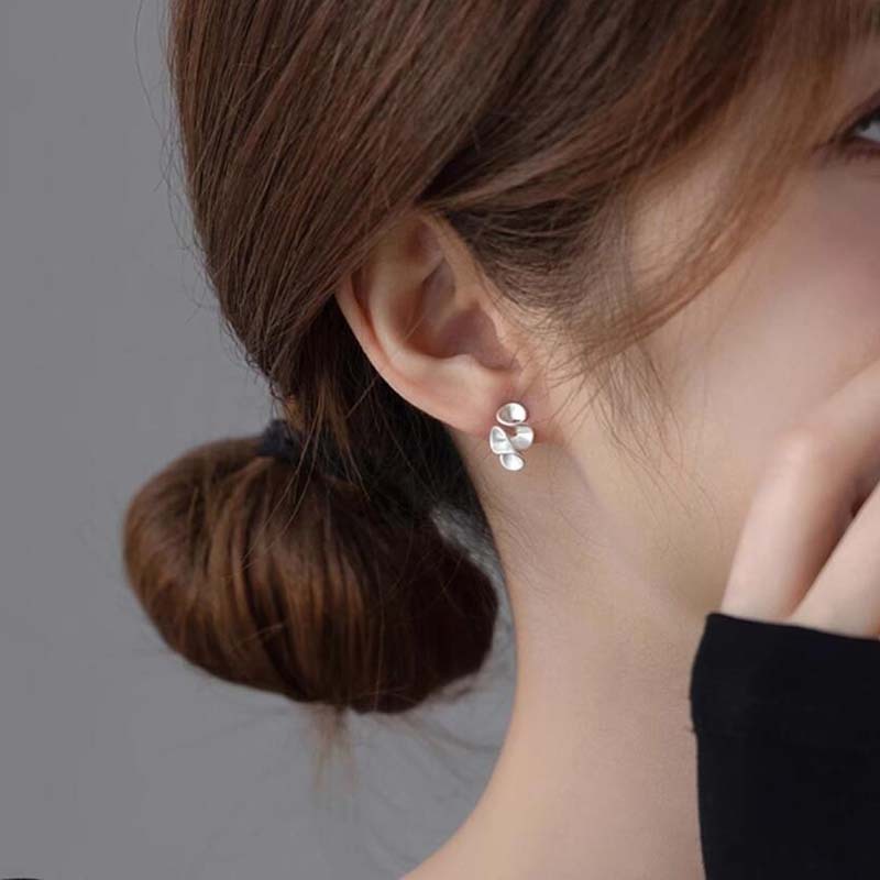 Matte gold stud earrings exude a sophisticated and luxurious feel