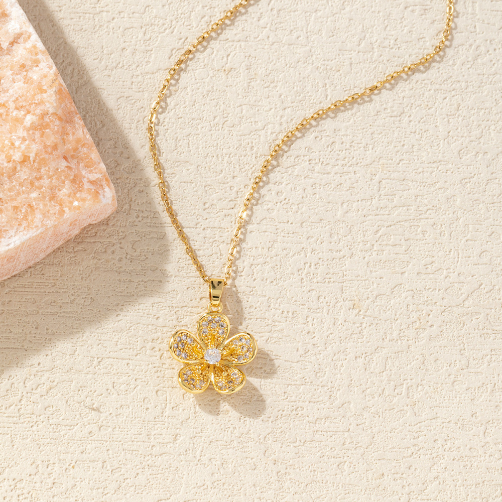 Diamond-encrusted peach blossom petal necklace with zircon