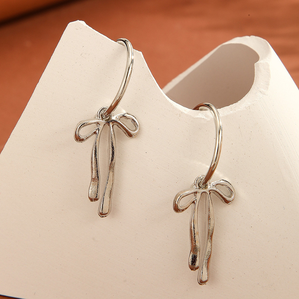 Stylish and elegant bow-tie alloy earrings