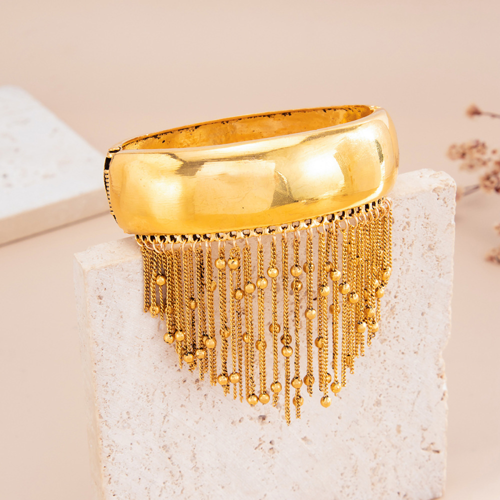 Antique-style tassel oval alloy spring bracelet