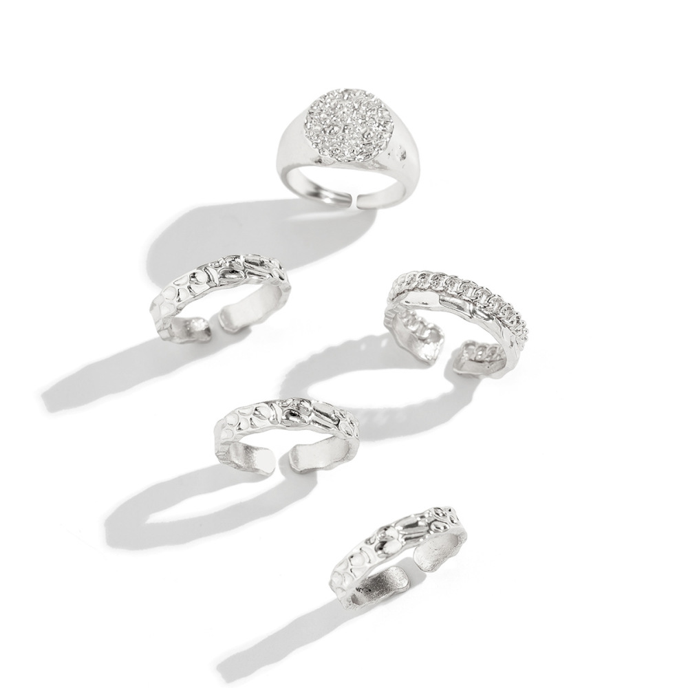 Geometric ring set with rhombus punk snake and rose alloy patterns
